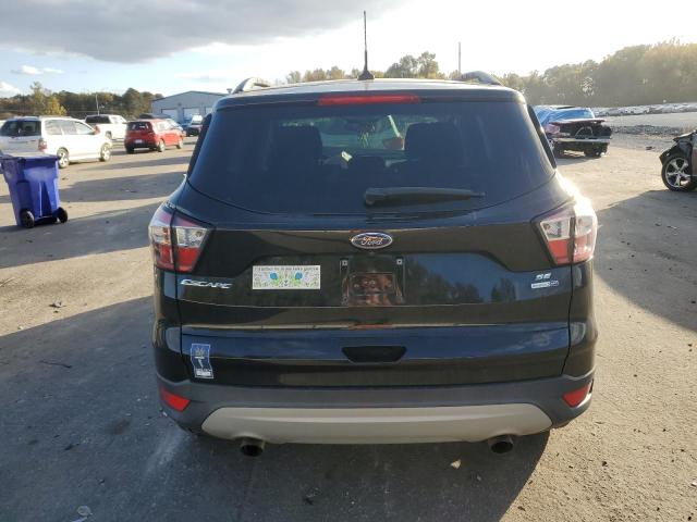 Photo 6 from auction – 2018 FORD ESCAPE SE with VIN 1FMCU9GD1JUC57852
