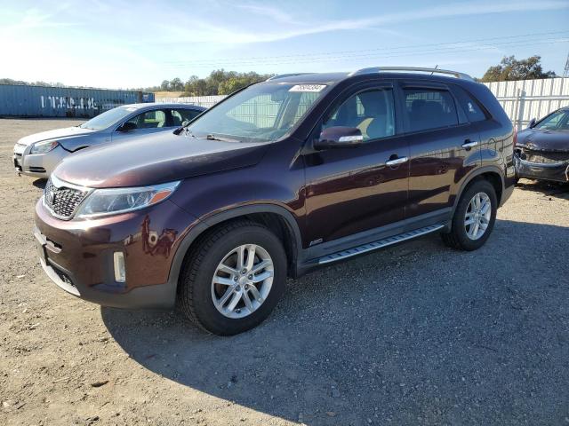 KIA SORENTO LX 2015 with VIN 5XYKTDA69FG554036 - Photo from auction