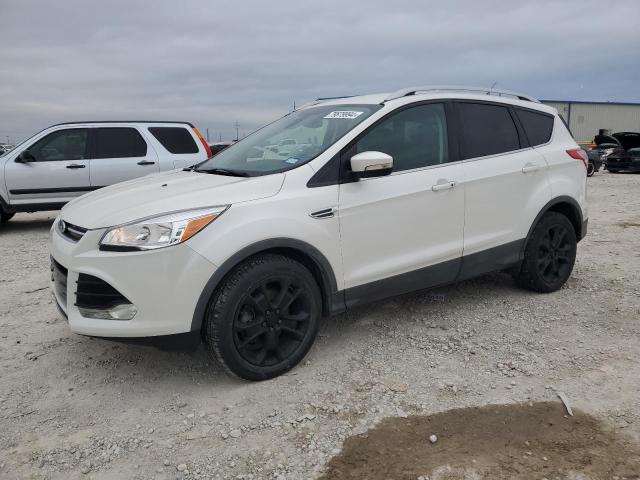 FORD ESCAPE TIT 2016 with VIN 1FMCU0J99GUA55642 - Photo from auction