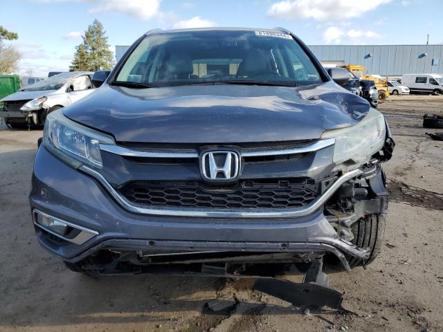 Photo 5 from auction – 2015 HONDA CR-V EXL with VIN 5J6RM4H77FL134722