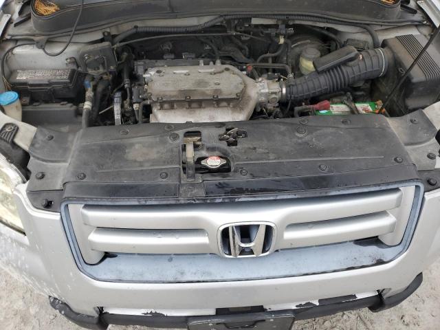Photo 12 from auction – 2006 HONDA PILOT EX with VIN 5FNYF28466B025709