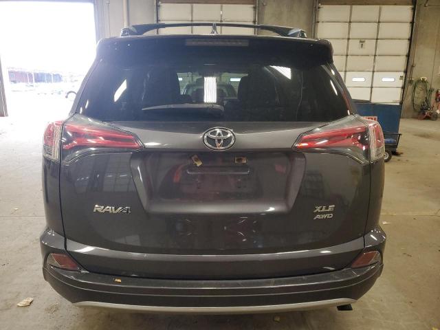 Photo 6 from auction – 2017 TOYOTA RAV4 XLE with VIN JTMRFREV9HJ112557