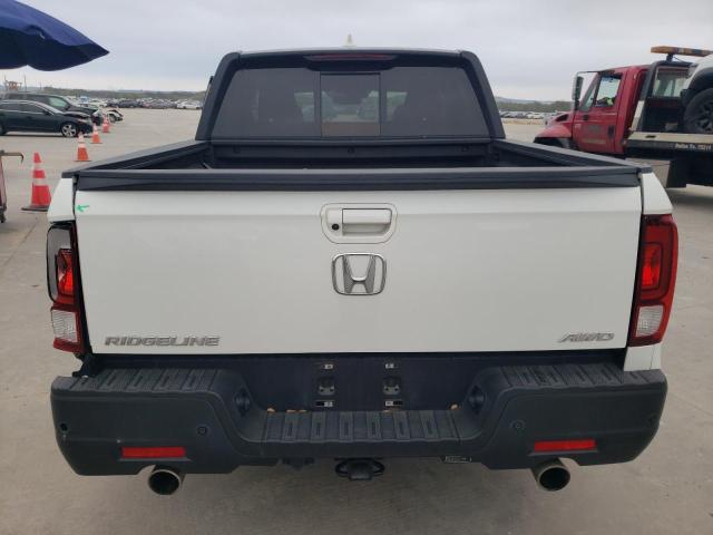 Photo 6 from auction – 2022 HONDA RIDGELINE with VIN 5FPYK3F89NB001496