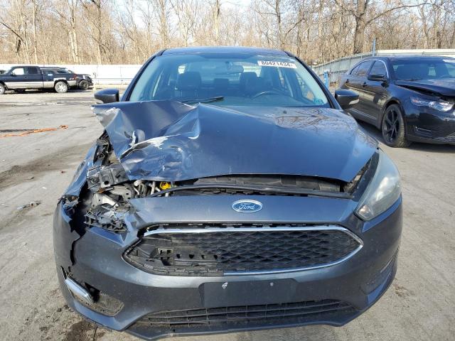 Снимка 5 от търг – 2015 FORD FOCUS SE с VIN 1FADP3F25FL271267