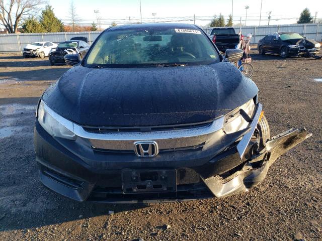 Photo 5 from auction – 2016 HONDA CIVIC LX with VIN 19XFC2F51GE029072