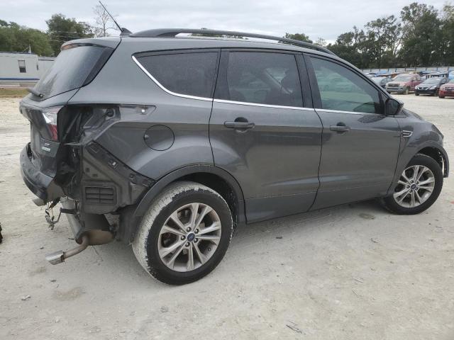 Photo 3 from auction – 2018 FORD ESCAPE SE with VIN 1FMCU0GD0JUA48825