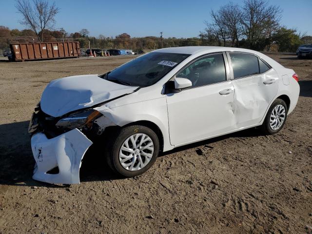 TOYOTA COROLLA L 2018 with VIN 5YFBURHE0JP850803 - Photo from auction