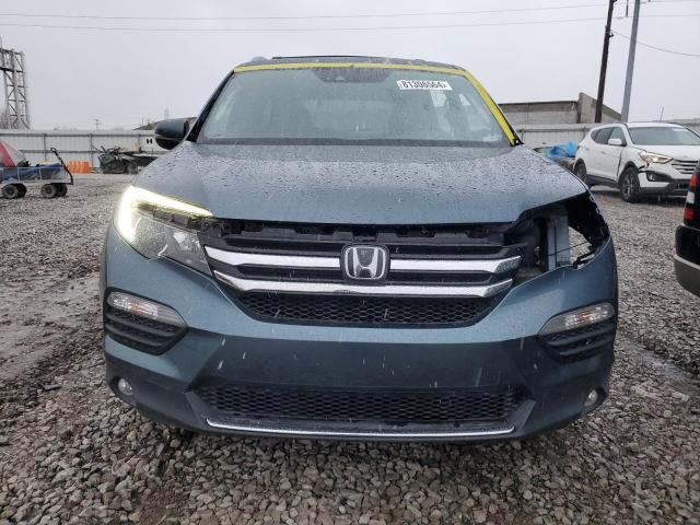 Photo 5 from auction – 2018 HONDA PILOT ELIT with VIN 5FNYF6H01JB032659