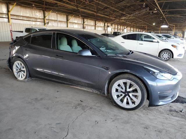 Photo 4 from auction – 2022 TESLA MODEL 3 with VIN 5YJ3E1EB9NF347849