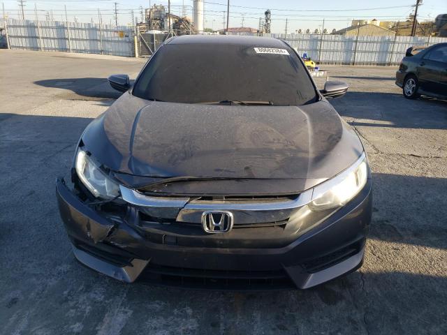 Photo 5 from auction – 2017 HONDA CIVIC LX with VIN 19XFC2F51HE003329