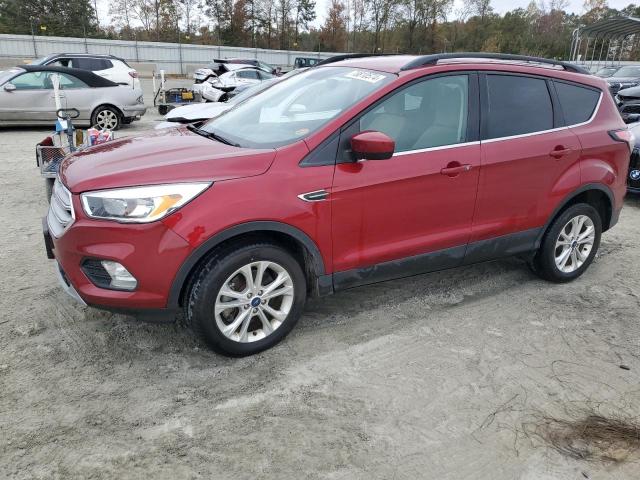 FORD ESCAPE SE 2018 with VIN 1FMCU9G9XJUC89260 - Photo from auction