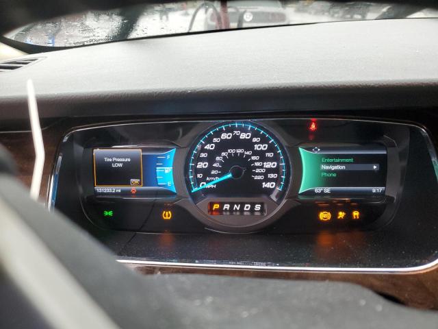 Photo 9 from auction – 2014 FORD TAURUS LIM with VIN 1FAHP2F80EG130744