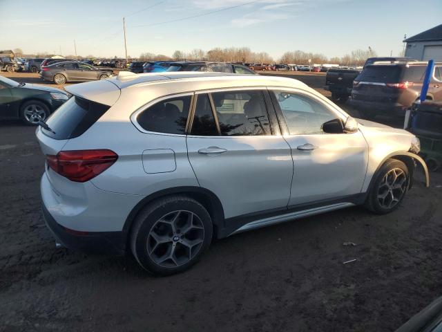 Photo 3 from auction – 2018 BMW X1 XDRIVE2 with VIN WBXHT3C36J3H32768