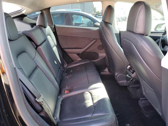 Photo 10 from auction – 2023 TESLA MODEL Y with VIN 7SAYGDEF8PF642581