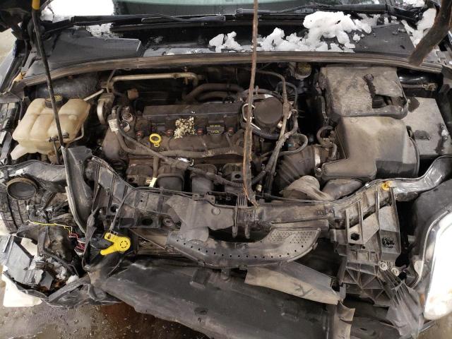 Photo 11 from auction – 2014 FORD FOCUS SE with VIN 1FADP3F27EL241685