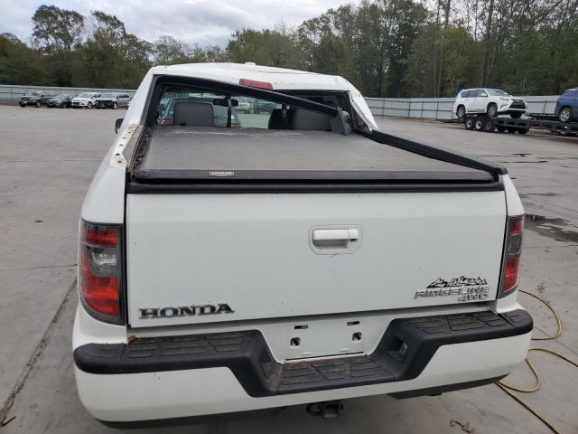 Photo 6 from auction – 2014 HONDA RIDGELINE with VIN 5FPYK1F53EB004842
