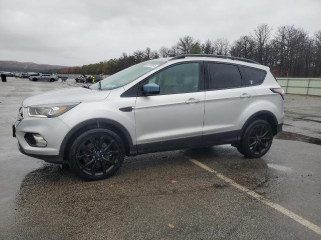 FORD ESCAPE SE 2018 with VIN 1FMCU9GD8JUA14958 - Photo from auction