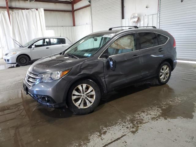 Photo 1 from auction – 2014 HONDA CR-V EXL with VIN 2HKRM4H74EH711537