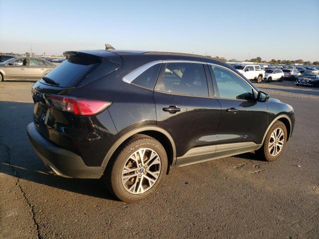Photo 3 from auction – 2021 FORD ESCAPE SEL with VIN 1FMCU9H68MUA64411