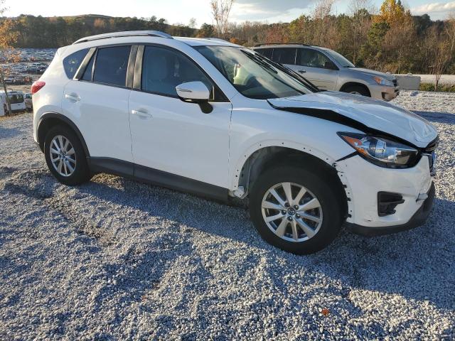 Photo 4 from auction – 2016 MAZDA CX-5 TOURI with VIN JM3KE2CY2G0871894