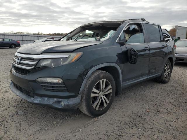 HONDA PILOT EXL 2016 with VIN 5FNYF6H58GB021159 - Photo from auction