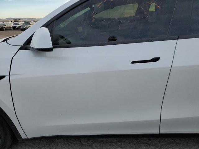 Photo 7 from auction – 2023 TESLA MODEL Y with VIN 7SAYGDEE2PA113549