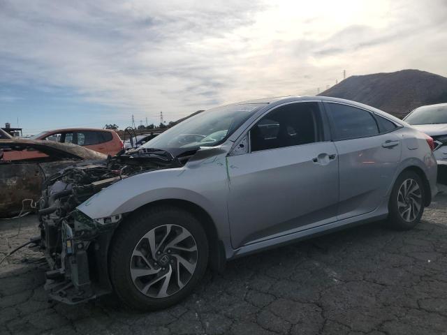 HONDA CIVIC EX 2017 with VIN 2HGFC2F74HH539778 - Photo from auction
