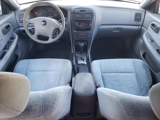 Photo 8 from auction – 2003 KIA OPTIMA LX with VIN KNAGD126035231284