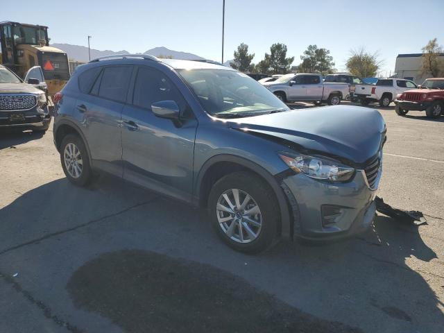 Photo 4 from auction – 2016 MAZDA CX-5 SPORT with VIN JM3KE2BY2G0685094