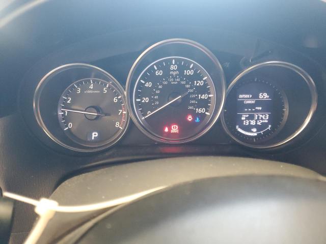 Photo 9 from auction – 2014 MAZDA CX-5 SPORT with VIN JM3KE2BE2E0362392