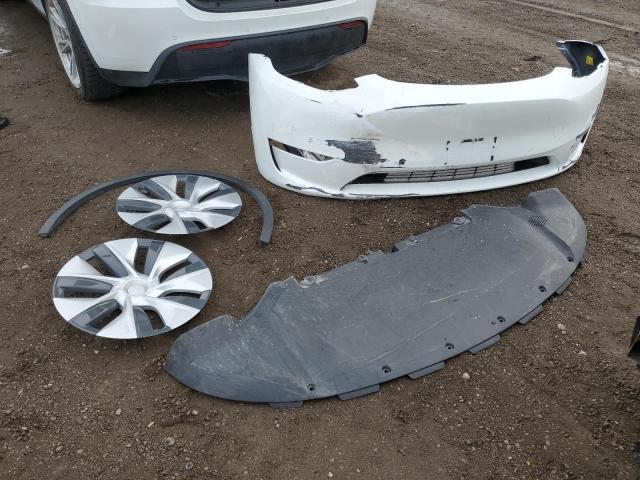 Photo 13 from auction – 2021 TESLA MODEL Y with VIN 5YJYGDED3MF119332