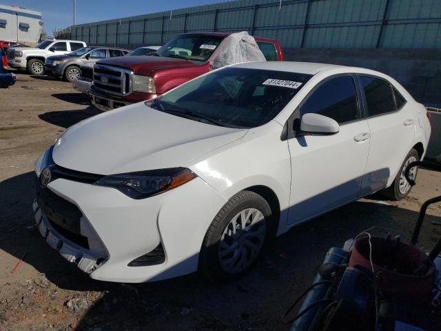 TOYOTA COROLLA L 2018 with VIN 5YFBURHE9JP810736 - Photo from auction