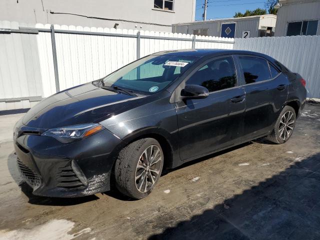 TOYOTA COROLLA L 2019 with VIN 5YFBURHE1KP866705 - Photo from auction
