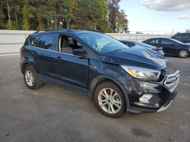 Photo 4 from auction – 2018 FORD ESCAPE SE with VIN 1FMCU9GD1JUC57852