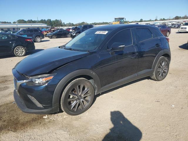 MAZDA CX-3 TOURI 2018 with VIN JM1DKDC77J0308148 - Photo from auction