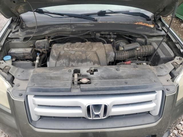 Photo 12 from auction – 2006 HONDA PILOT EX with VIN 2HKYF18456H529373