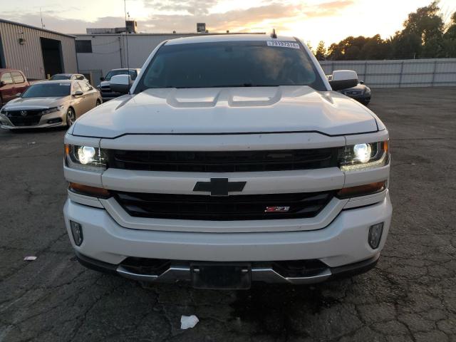 Photo 5 from auction – 2018 CHEVROLET SILVERADO with VIN 3GCUKREC6JG493134