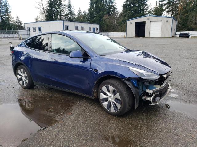 Photo 4 from auction – 2023 TESLA MODEL Y with VIN 7SAYGAEE6PF880192