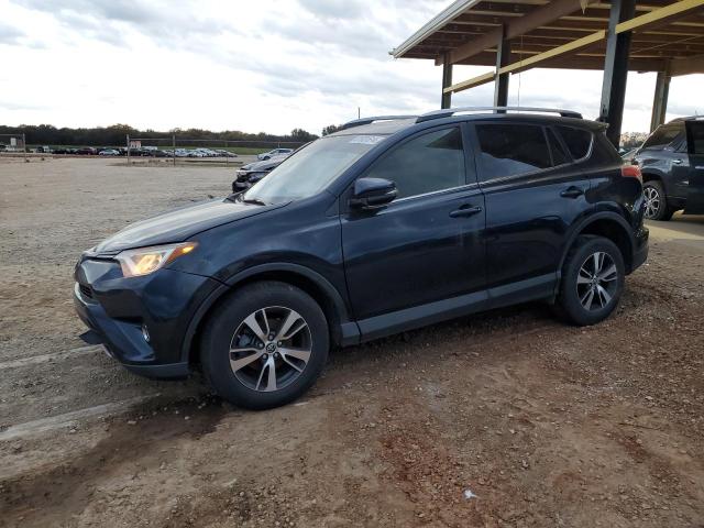 TOYOTA RAV4 XLE 2017 with VIN JTMWFREV7HD104992 - Photo from auction