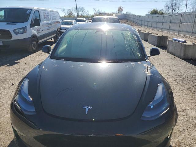 Photo 5 from auction – 2022 TESLA MODEL 3 with VIN 5YJ3E1EB8NF272965