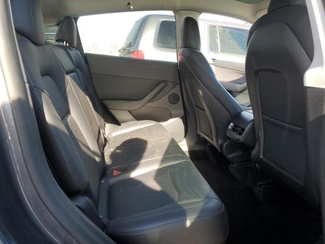 Photo 11 from auction – 2022 TESLA MODEL Y with VIN 7SAYGDEFXNF406060