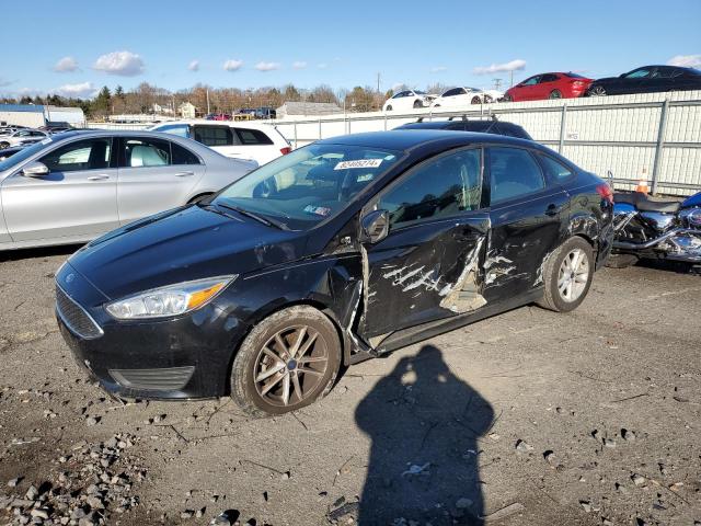 FORD FOCUS SE 2017 with VIN 1FADP3F28HL345316 - Photo from auction