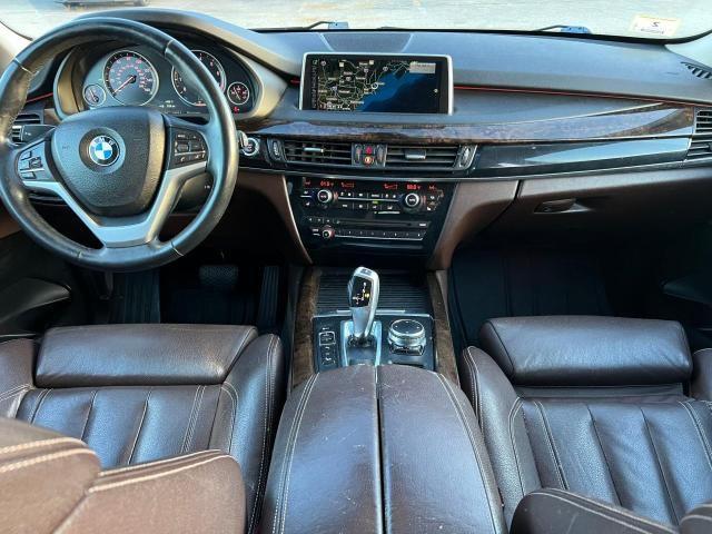 Photo 9 from auction – 2015 BMW X5 XDRIVE5 with VIN 5UXKR6C55F0J77997