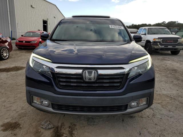 Photo 5 from auction – 2019 HONDA RIDGELINE with VIN 5FPYK3F77KB010622