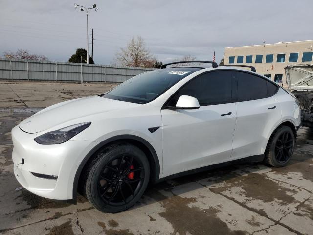 TESLA MODEL Y 2022 with VIN 7SAYGDEF9NF460367 - Photo from auction