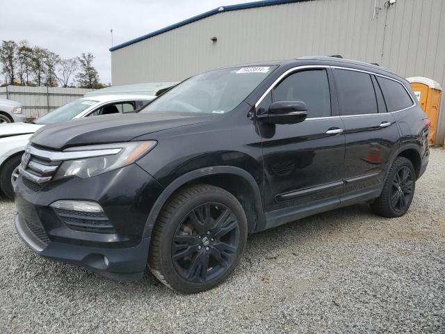 HONDA PILOT ELIT 2018 with VIN 5FNYF6H06JB017459 - Photo from auction