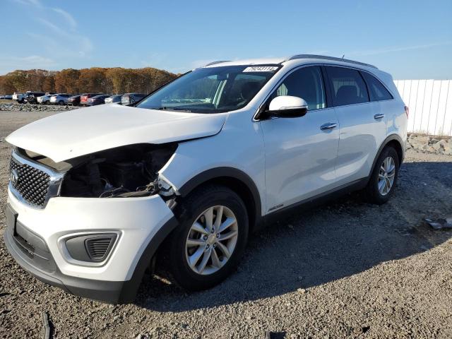 KIA SORENTO LX 2016 with VIN 5XYPGDA54GG131125 - Photo from auction