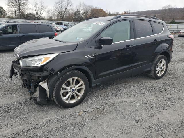 FORD ESCAPE SE 2018 with VIN 1FMCU9GD9JUA73971 - Photo from auction