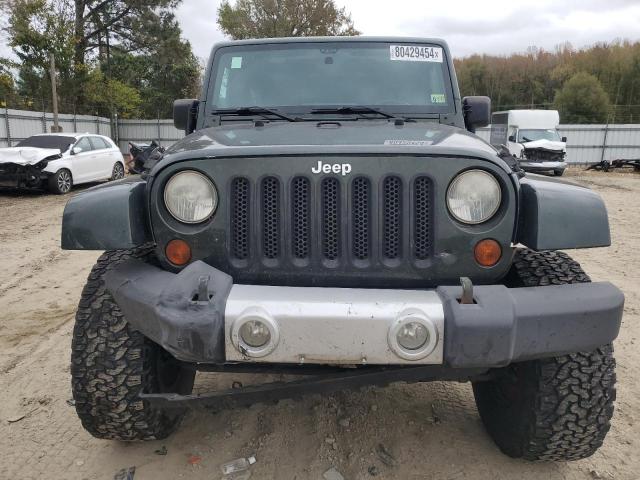 Снимка 5 от търг – 2011 JEEP WRANGLER U с VIN 1J4BA5H16BL557068