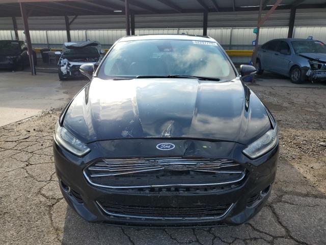 Photo 5 from auction – 2016 FORD FUSION TIT with VIN 3FA6P0K98GR323830